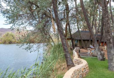 Omarunga Lodge exterior Kunene River bank Epupa Falls Kaokoland Damaraland Namibia