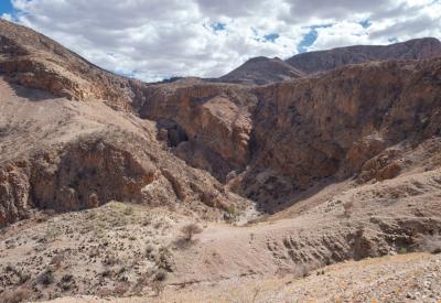 Walking through BullsPort Rock Arch Namib Naukluft Mountains Namibia guided tour