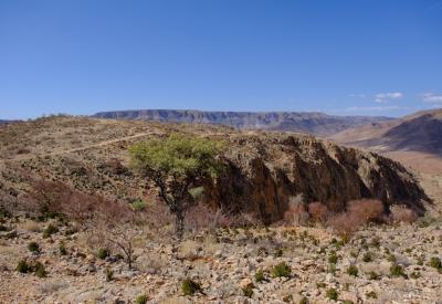 Walking through BullsPort Rock Arch Namib Naukluft Mountains Namibia guided tour