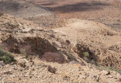 Namib Naukluft sheer cliffs rocky outcrops BullsPort Rock Arch tour Namibia photography