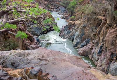 Rainbow in Epupa Falls mist Kunene River Kaokoveld Namibia photography