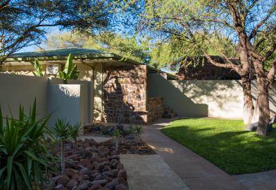 Erindi Old Traders Lodge large luxury suite interior bushveld views Namibia