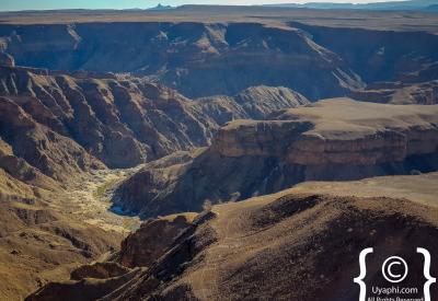 Fish River Canyon rim looking down to river floor 550m depth Namibia photography