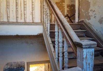Kolmanskop Namib Desert sand dunes encroaching abandoned buildings Luderitz Namibia