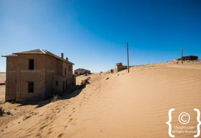 Kolmanskop ghost town sand-filled rooms diamond mining Namibia Luderitz