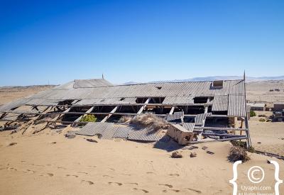 Kolmanskop collapsed ceiling floors abandoned diamond town Namibia ghost town