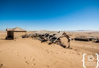 Kolmanskop ghost town sand-filled rooms diamond mining Namibia Luderitz