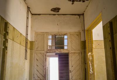 Kolmanskop sand patterns tiled floor abandoned diamond town Luderitz Namibia