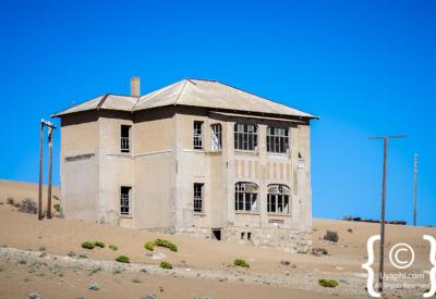 Kolmanskop abandoned buildings peeling paint Namibia ghost town Luderitz