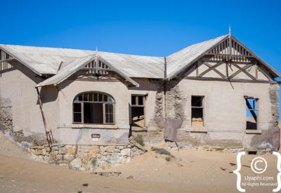 Kolmanskop abandoned buildings peeling paint Namibia ghost town Luderitz