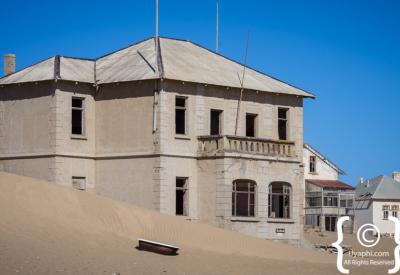 Kolmanskop abandoned buildings peeling paint Namibia ghost town Luderitz