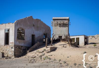 Kolmanskop Namib Desert sand drifting through doorways ghost town Namibia