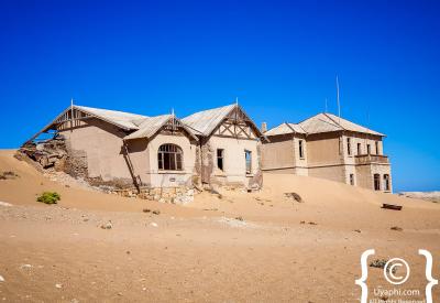 Kolmanskop Namib Desert sand drifting through doorways ghost town Namibia