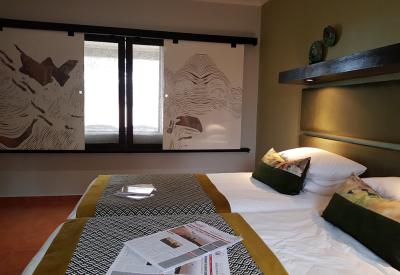 Namib Desert Lodge comfortable guest room en-suite shower verandah Namib Desert Namibia