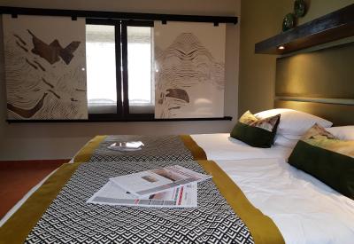 Namib Desert Lodge comfortable guest room en-suite shower verandah Namib Desert Namibia
