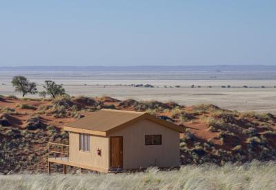 Namib Dune Star Camp sunset walk drinks dunes Namib Desert overnight excursion Namibia