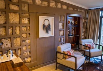 Onguma Bush Camp room verandah waterhole bushveld views Etosha Namibia self-drive