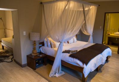 Onguma Bush Camp central guest area waterhole views fish terrapins Etosha Namibia