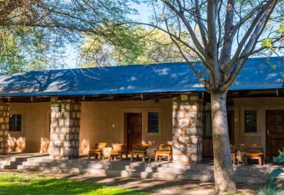 Onguma Bush Camp Deluxe Waterhole Room comfortable twin beds Etosha Namibia