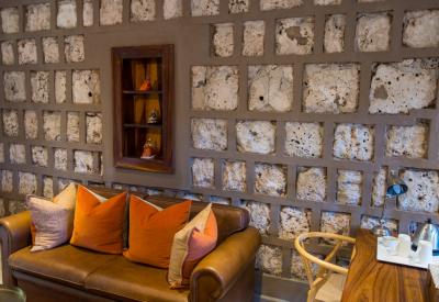 Onguma Bush Camp room verandah waterhole bushveld views Etosha Namibia self-drive