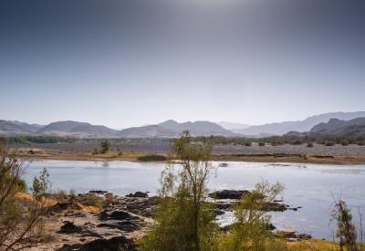Orange River arid rocky landscape Richtersveld Namibia South Africa border C13 road