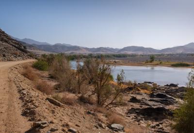 Orange River arid rocky landscape Richtersveld Namibia South Africa border C13 road