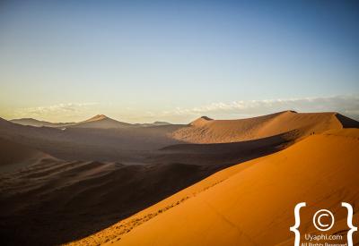 Sossusvlei red orange sand dunes panoramic view Namib Naukluft Park Namibia