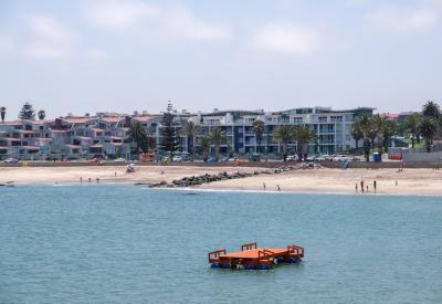 Swakopmund beach Atlantic Ocean Namib Desert backdrop Namibia summer photography