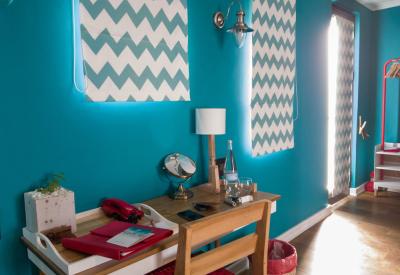 The Delight Swakopmund large colourful guest room comfortable beds Swakopmund Namibia