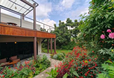 Tiloreza Volcanoes Ecolodge en-suite bathroom and separate outdoor shower Premium Deluxe Suite Rwanda