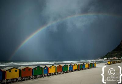 Surfers at Muizenberg beach False Bay Cape Town beginner surf spot South Africa