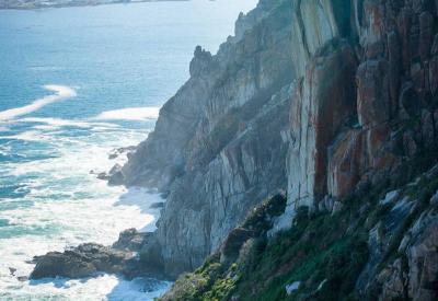 Chapman's Peak Drive road carved into mountain cliff face Hout Bay Cape Town South Africa