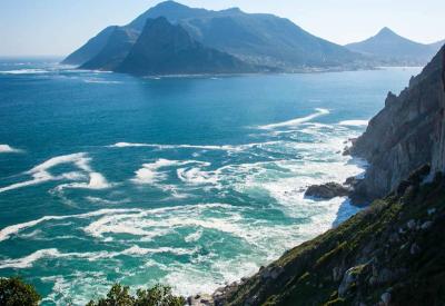 Chapman's Peak Drive road carved into mountain cliff face Hout Bay Cape Town South Africa
