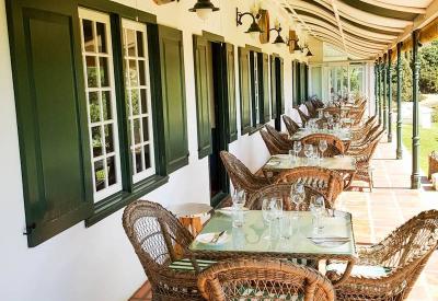 Constantia Glen outdoor wine tasting area overlooking Cape Flats and Stellenbosch mountains