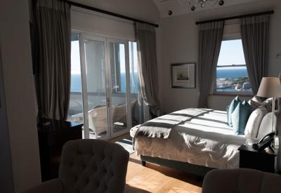 Tintswalo Boulders lounge bar and music room with panoramic False Bay views Simon's Town