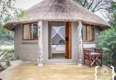 Umlani Bush Camp rustic chalet interior mosquito net Timbavati Game Reserve South Africa