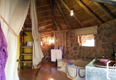 Jaci's Safari Lodge tented room interior mosquito net Madikwe Game Reserve South Africa