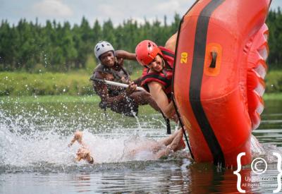 White water raft flipping grade 5 Nile River Uganda adventure safari