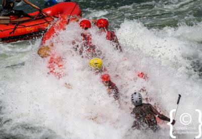 White water rafting team cheering Nile River Jinja Uganda