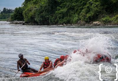 Raft emerging grade 5 rapid Nile River Uganda white water rafting