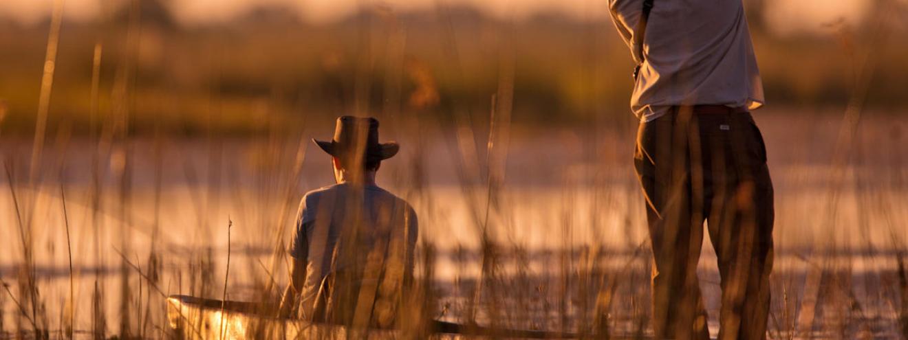 Perfect Okavango Delta honeymoon safari Botswana luxury suites mokoro helicopter romantic dinners sundowners