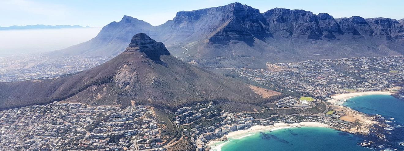Helicopter flight over Cape Town V&A Waterfront Table Mountain Camps Bay 12 Apostles Atlantic Ocean