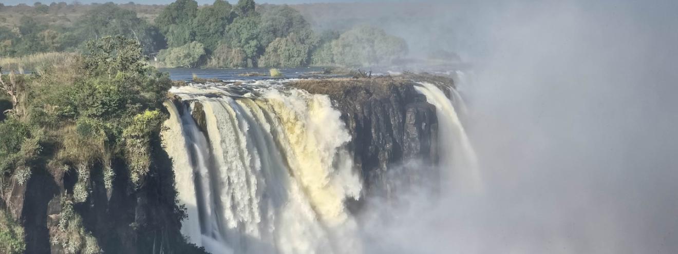 10 reasons to visit Victoria Falls Zimbabwe Zambia largest waterfall Devil's Pool Zambezi safari rainforest