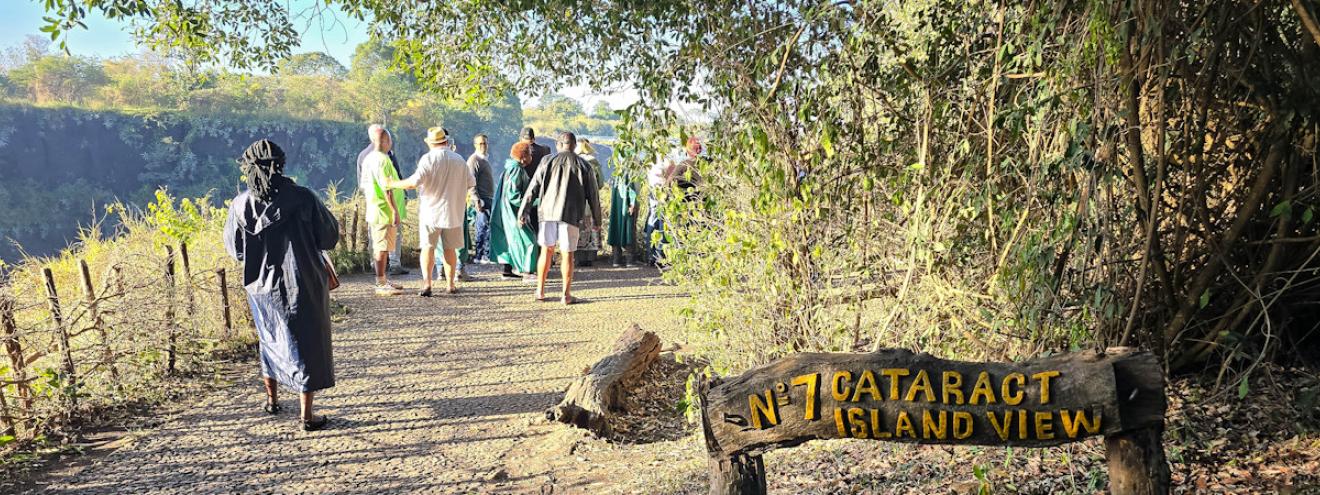 Victoria Falls travel bucket list Zimbabwe Zambia Seventh Natural Wonder helicopter bungee rafting Devil's Pool