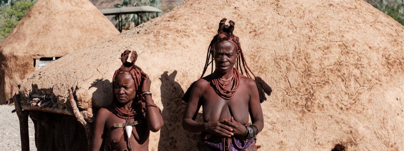 Himba village cultural tour Kunene River Omarunga Lodge Kaokoland Namibia nomadic tribe