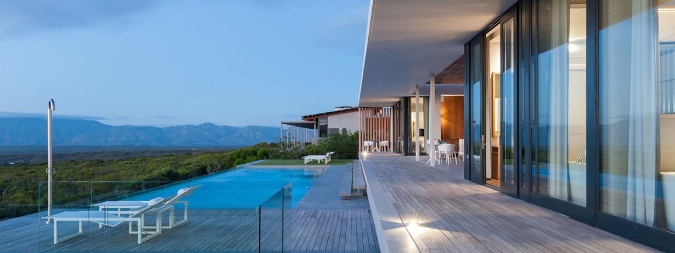 Exterior view of Grootbos Villas surrounded by lush greenery