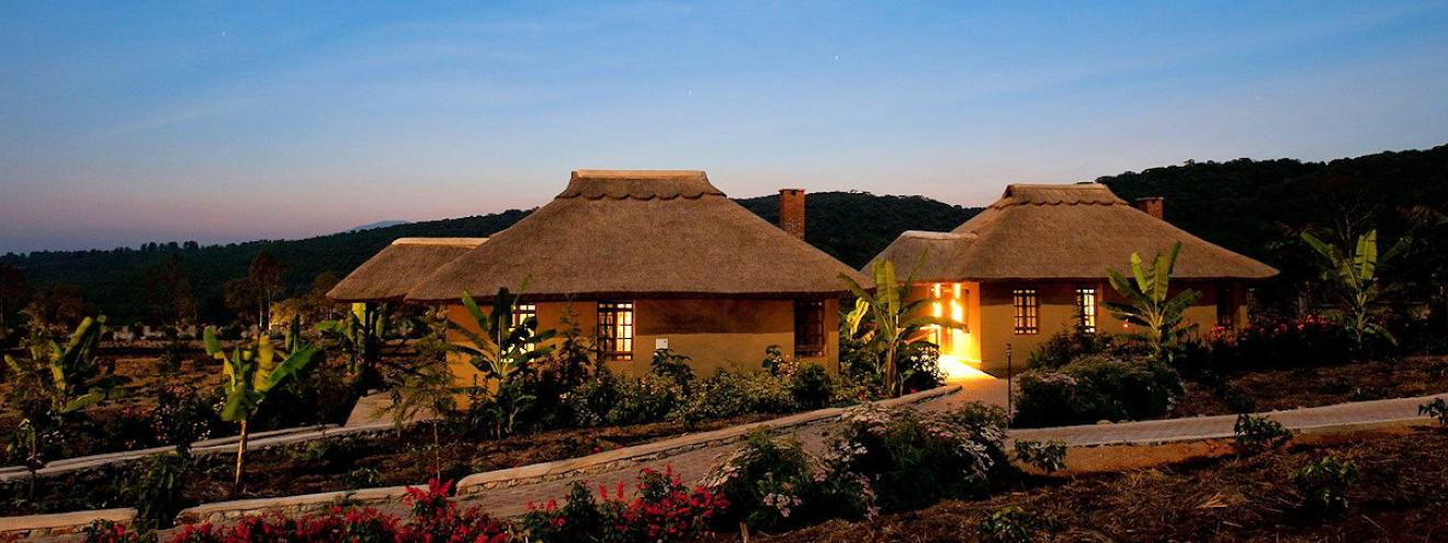 Kitela Lodge 20 colonial thatched cottages coffee plantation waterfall Karatu Tanzania