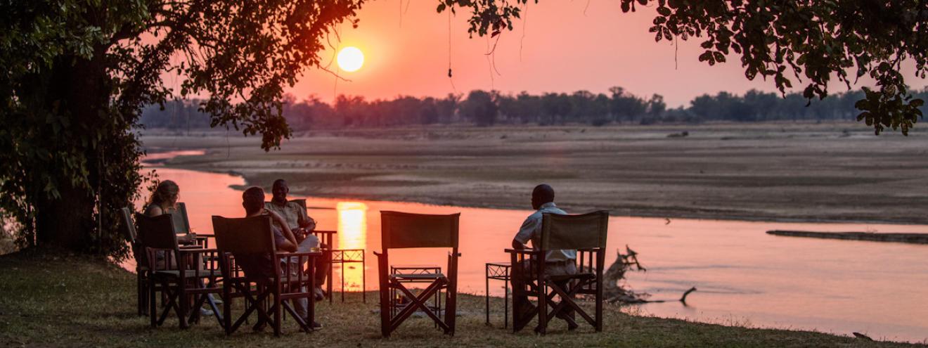 Tafika Camp beautifully designed classic thatched safari chalets offering privacy along the banks of the Luangwa River