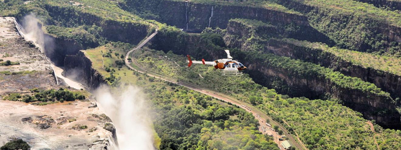 Victoria Falls Mosi-oa-Tunya 1708m longest curtain falling water Seven Wonders Zimbabwe