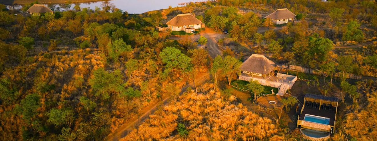 Nantwich Lodge Hwange 9 thatched suites hillside dam views Northern Hwange Zimbabwe